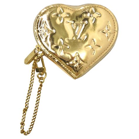 louis vuitton gold heart coin purse|louis vuitton coin purses sale.